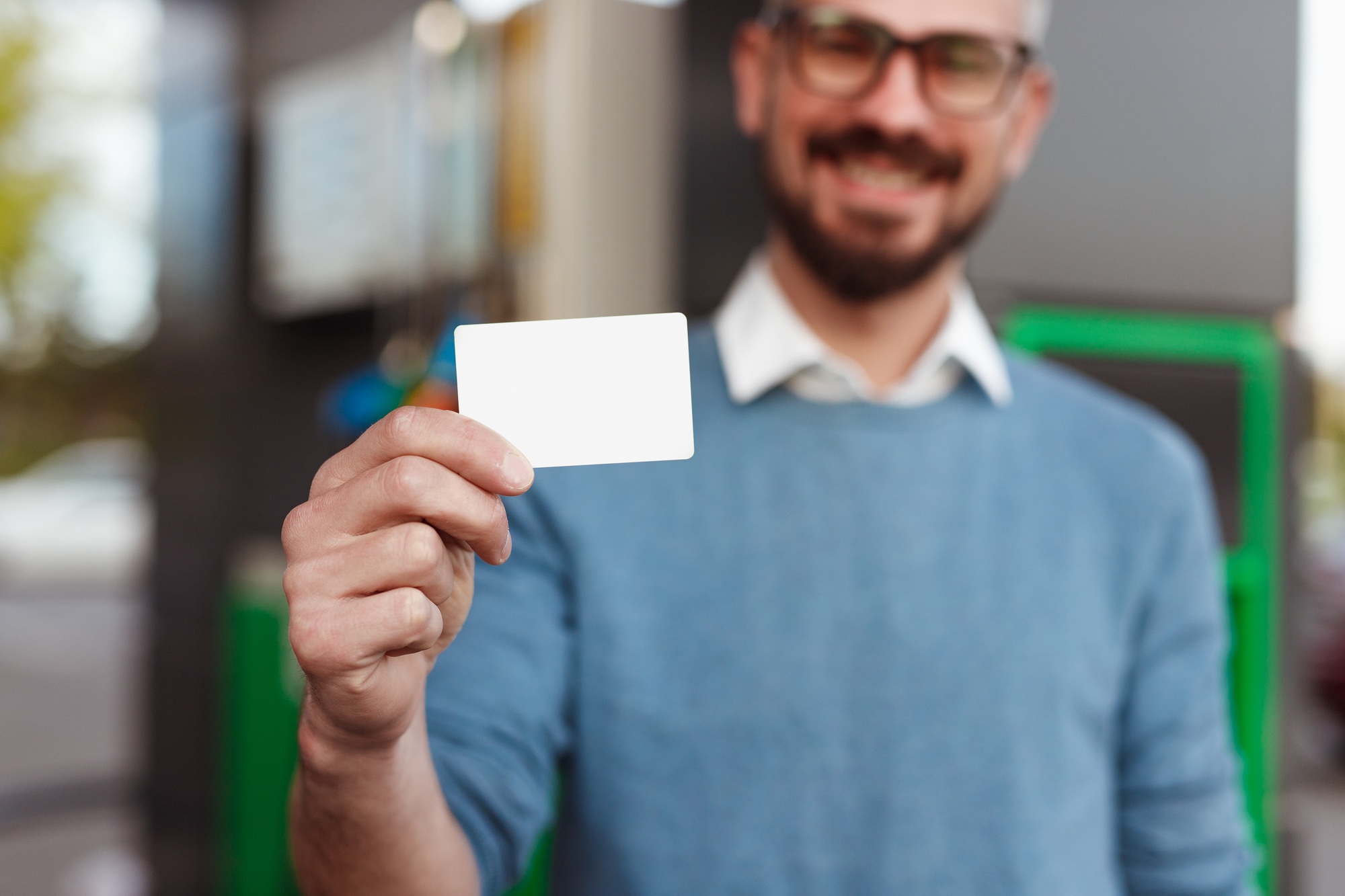 Happy client demonstrating blank card